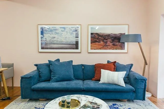 living room with blue couch
